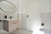 Badezimmer - Aufgepasst: Moderne und lichtdurchflutete Wohnung in Hasbergen!