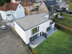 Seitenansicht Haus - Zentrale Neubauwohnung mit Terrasse – 2 Zimmer, modern & hell
