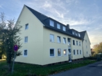 Außenansicht Seite - Vermietete Wohnung: Attraktive Kapitalanlage Nähe Osnabrück
