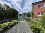 Garten - Vielseitiges Wohn-/Geschäftshaus – Ihre Chance auf ein attraktives Investment!
