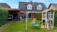 Ansicht - Jung und attraktiv! Doppelhaushälfte mit Garage und PV-Anlage