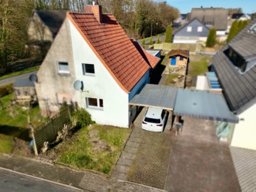 Charmante Doppelhaushälfte mit Entwicklungspotenzial, 59320 Ennigerloh, Einfamilienhaus
