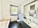 Badezimmer - Exklusive Erdgeschosswohnung mit Balkon und Gartenzugang in Georgsmarienhütte