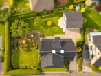 Haus von oben - Gepflegtes Einfamilienhaus mit sonnigem Garten