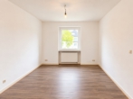 Zimmer1 - 3-Zimmer-Wohnung mit großem Gartenhighlight