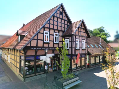 Attraktive Immobilie – 3 Wohneinheiten, plus großzügiger Gewerbeeinheit, 49584 Fürstenau, Mehrfamilienhaus