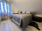 Schlafzimmer - Großzügige Dachgeschosswohnung mit Balkon