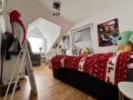 Kinderzimmer - Großzügige Dachgeschosswohnung mit Balkon