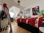 Kinderzimmer - Großzügige Dachgeschosswohnung mit Balkon