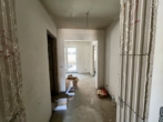 Eingangsbereich mit Flur - Achtung !! Perfekte Kapitalanlage: KfW 40 Neubauwohnung in Haste