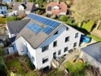 Rückansicht - Energetisch aktuell! 3-Familienhaus mit PV-Anlage