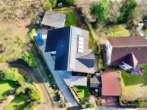 Vogelperspektive - Energetisch aktuell! 3-Familienhaus mit PV-Anlage