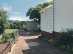 Einfahrt und Garage - Zuhause mit Zukunft – Charmante Familienresidenz in bester Lage