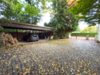 Carport - Familienfreundliches Einfamilienhaus mit Wintergarten, Kamin und großem Garten