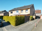 Hausansicht - Anlegen in Hollage: Mehrparteienhaus in begehrter Wohnlage