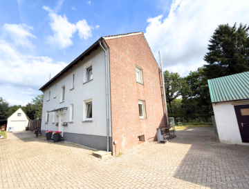 Mehrfamilienhaus mit Garten, Kamin & Garage – ideal für Familien oder Kapitalanleger, 49179 Ostercappeln, Mehrfamilienhaus