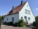 Hausansicht - Selten! Traumhaus in Hanglage mit Kaminofen