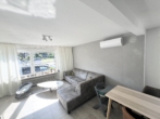 Wohnzimmer - Charmantes Wohn- & Geschäftshaus mit Garten – Leben, Arbeiten, Wohlfühlen