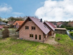 Rückansicht - Charmantes Familienhaus mit Gartenidylle und vielseitigen Nutzungsmöglichkeiten
