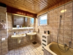 Badezimmer KG - Modern wohnen, naturnah leben – renoviertes Zuhause mit Garten-Oase