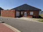 Titelbild - Charmanter Bungalow mit Anliegerwohnung in Dissen
