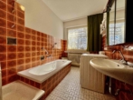 Bad - Größer als gedacht! Bungalow mit Wintergarten in Vechta