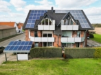 Hausansicht - TOP MFH mit 7 WE – Seltene Investmentchance: Modernes Mehrfamilienhaus kaufen
