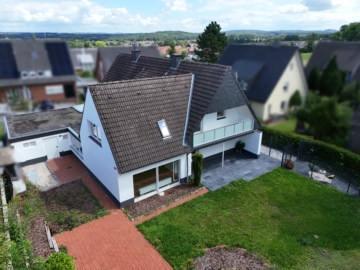 Lichtdurchflutete Wohnung mit Einfamilienhaus-Charme und Garten, 49205 Hasbergen, Erdgeschosswohnung