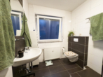 Badezimmer OG - Mehrfamilienhaus mit drei Wohneinheiten in Lotte