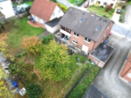 Gartenansicht - Mehrfamilienhaus mit drei Wohneinheiten in Lotte